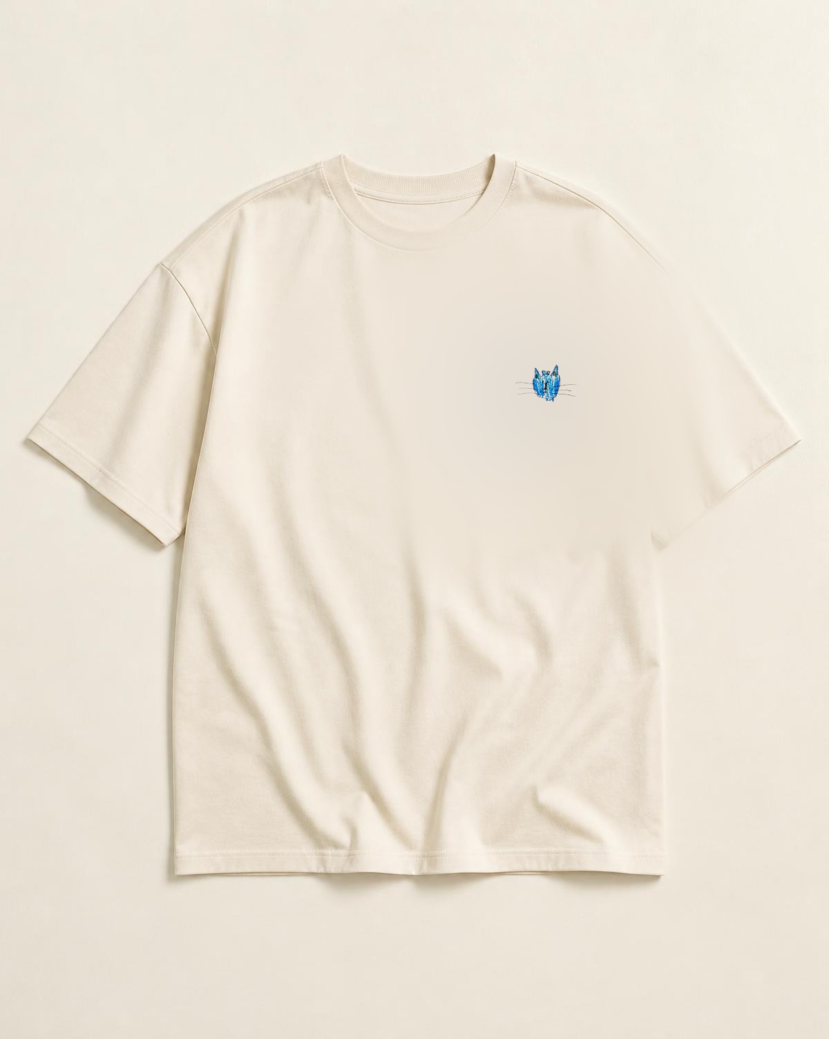 Blue Cat Founding Tee — small original drawing on the left chest of the ivory tee
